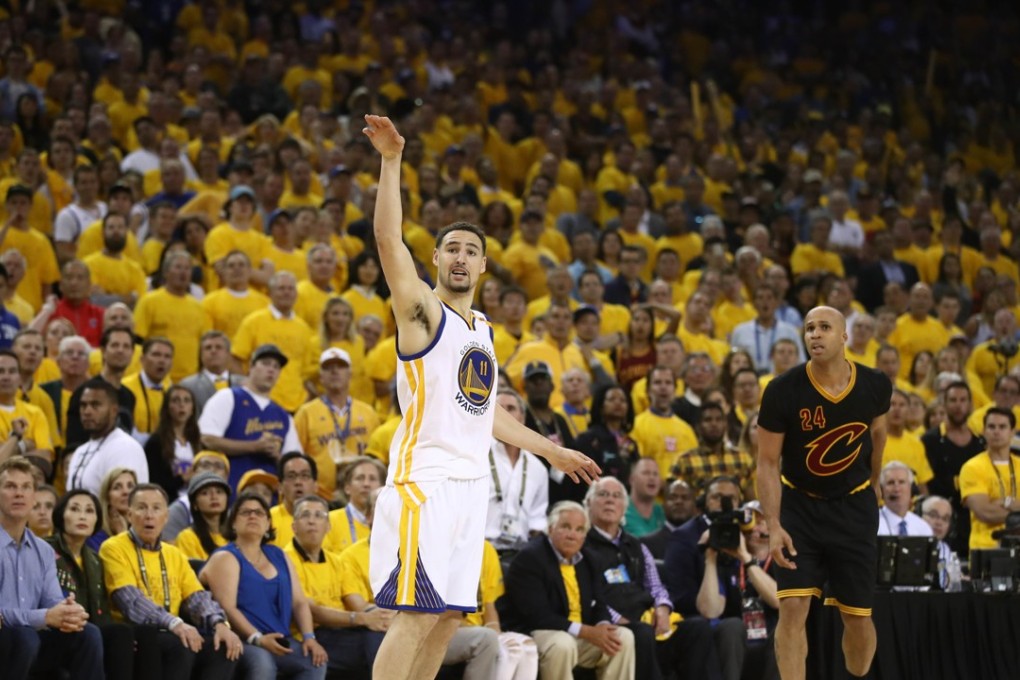 Klay Thompson of the Golden State Warriors watches his jump shot during his team’s game two win over the Cleveland Cavaliers in the NBA Finals. Photo: AFP