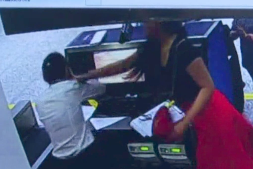 The woman seen on surveillance camera footage striking the staff member. Photo: Handout