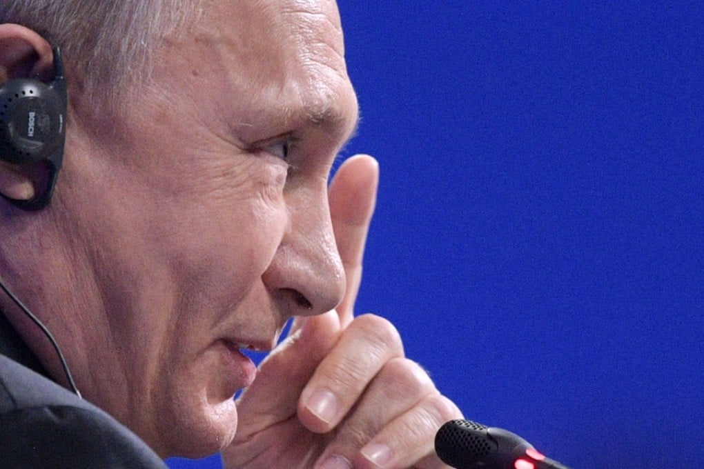 Russian President Vladimir Putin speaks during a session of the St Petersburg International Economic Forum on Friday. Photo: AFP