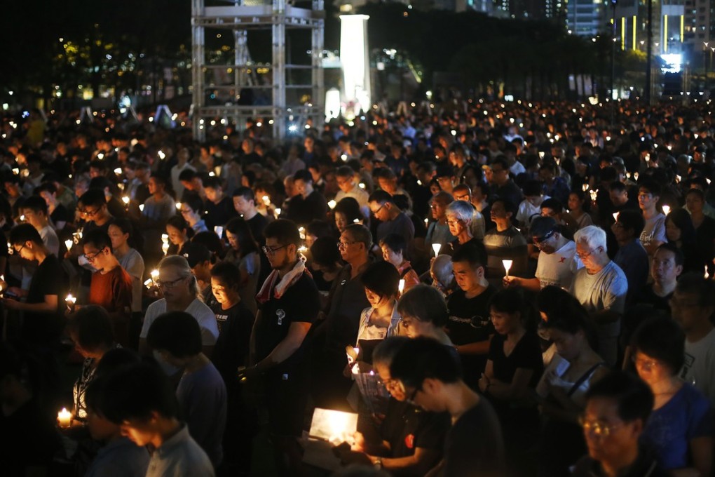 Thousands gather at the annual June 4 vigil in Victoria Park. Photo: Sam Tsang