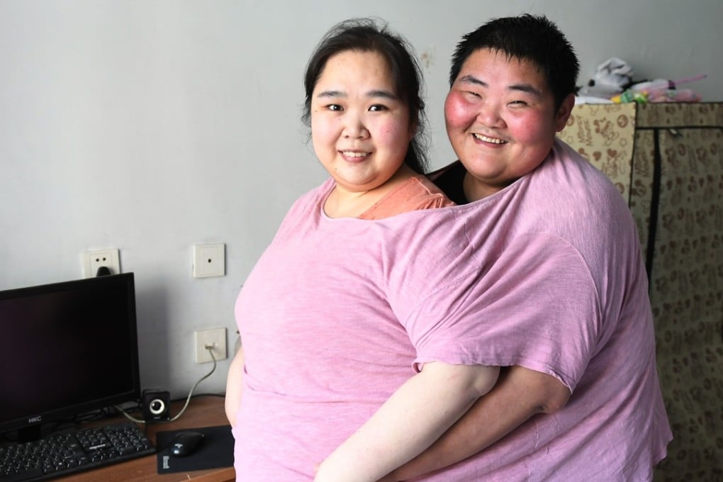 Healthier times: Lin Yue and Deng Yang have lost 200kg between them. Photo: CNA