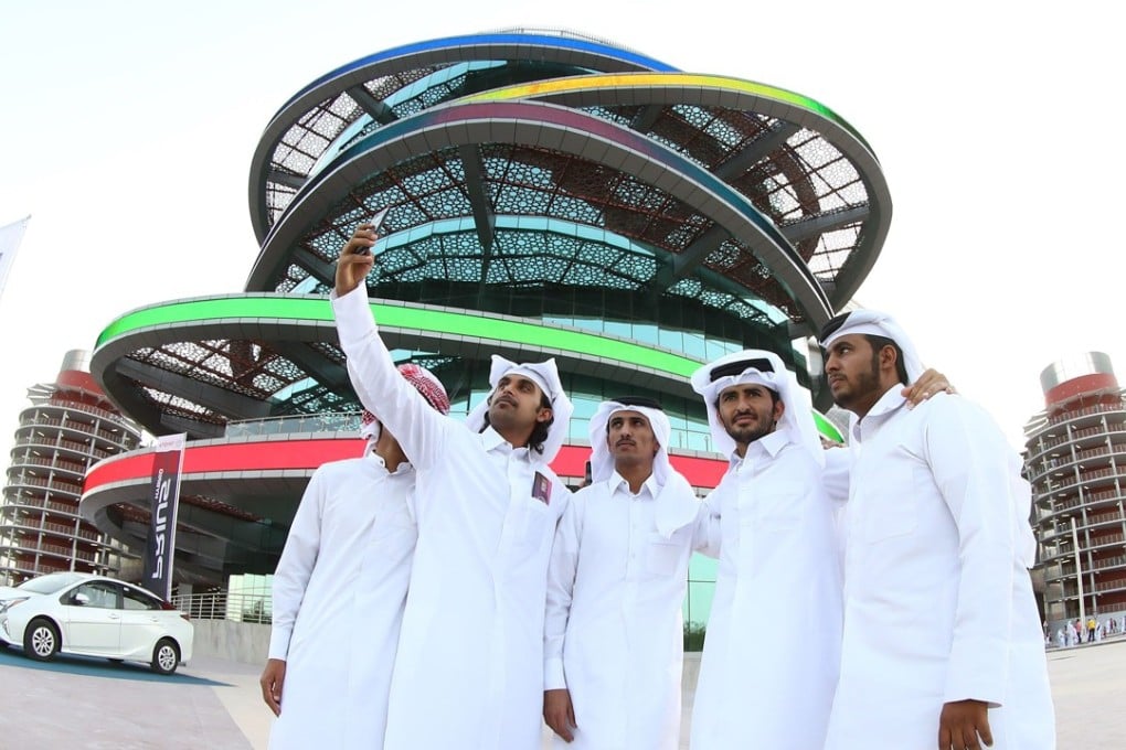 Fans outside the Khalifa International Stadium in Doha, after it was refurbished for the 2022 World Cup. Photo: AFP