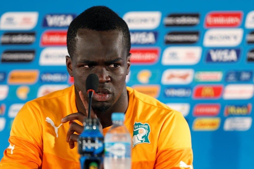 Ivory Coast player Cheick Ismael Tiote answers questions during a news conference at the Mane Garrincha National Stadium in Brasilia. Tiote collapsed and died while training with Beijing Enterprises. Photo: Reuters