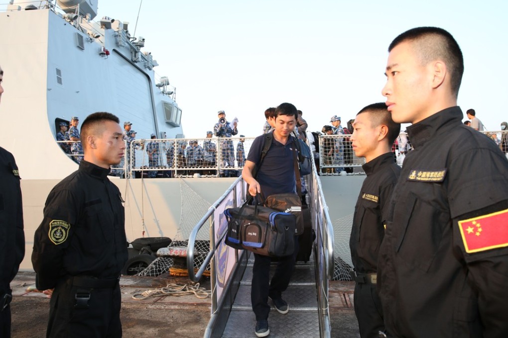 PLA sailors escort Chinese evacuees from war-torn Yemen upon arrival in Djibouti, in 2015. China’s construction of a naval logistics centre in Djibouti is being seen by the Pentagon as part of a worldwide expansion. Photo: Xinhua