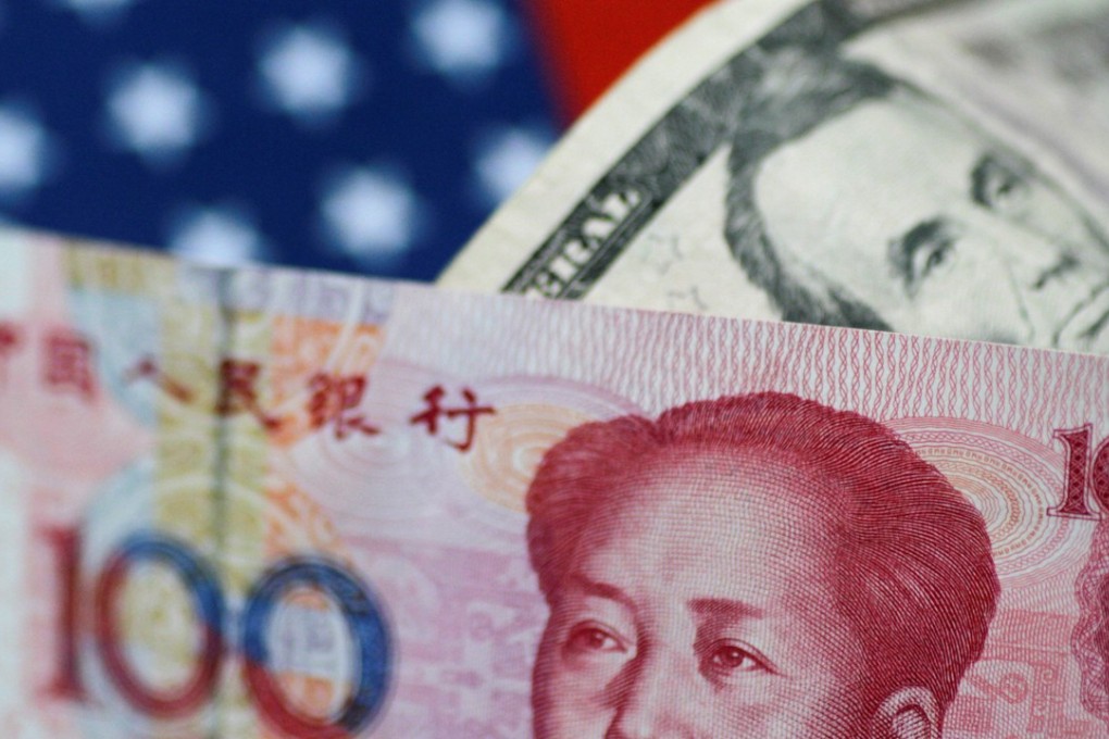 The US dollar and a Chinese yuan notes are seen in this picture illustration. China has again picked up its purchases of US treausuries as the yuan stabilises. Photo: Reuters