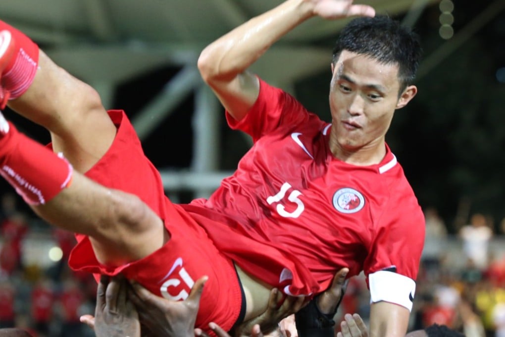 Chan Wai-ho is thrown into the air by Hong Kong teammates. Photo: K.Y. Cheng