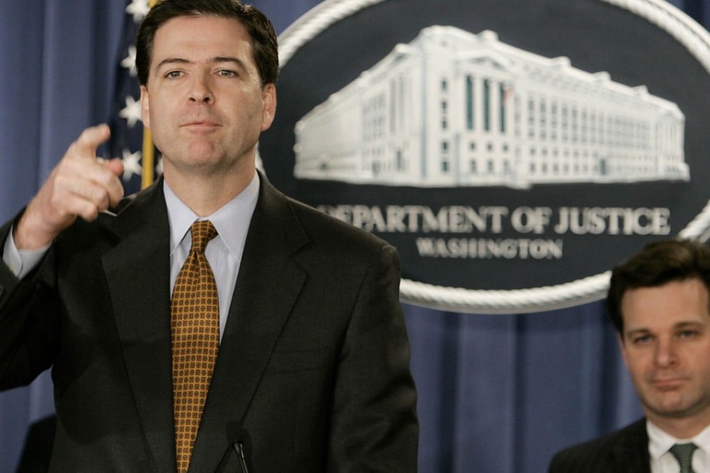 A photo taken on December 15, 2004, shows then deputy US attorney general James Comey (left) at a news conference with assistant attorney general Christopher Wray, the man who is now set to succeed Comey as director of the FBI. Photo: AFP