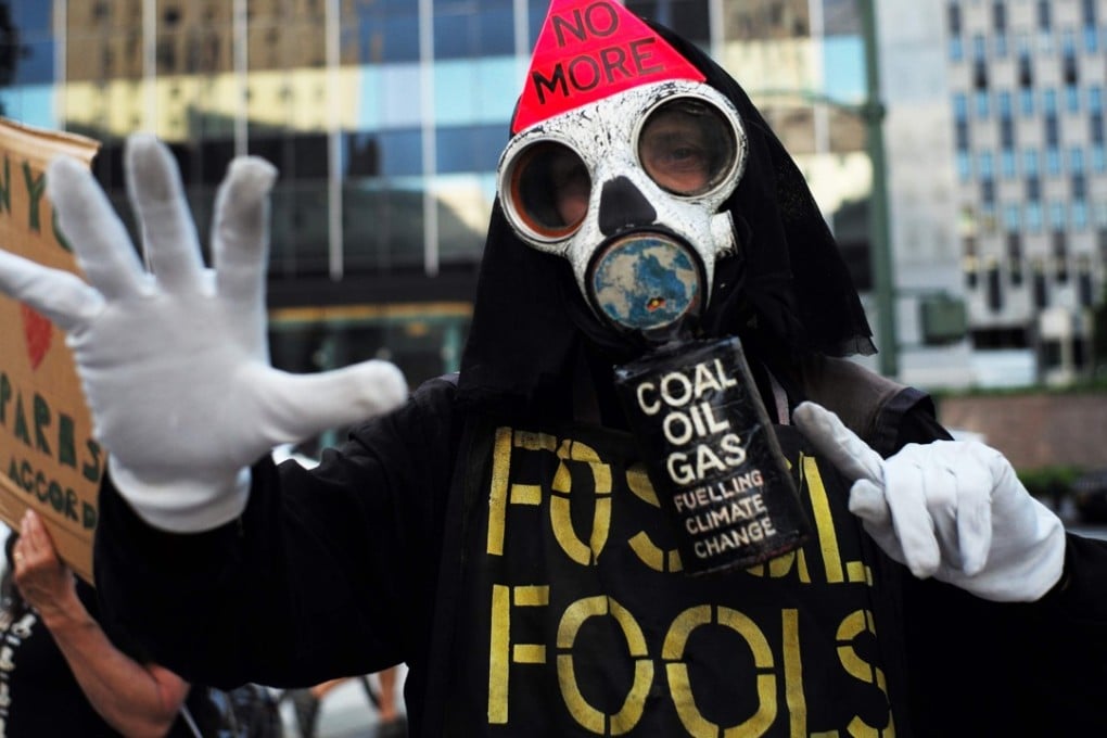 Environmental activists take part in a demonstration in New York on June 1 to protest against US President Donald Trump's decision to pull out of the Paris climate accord deal. Photo: AFP