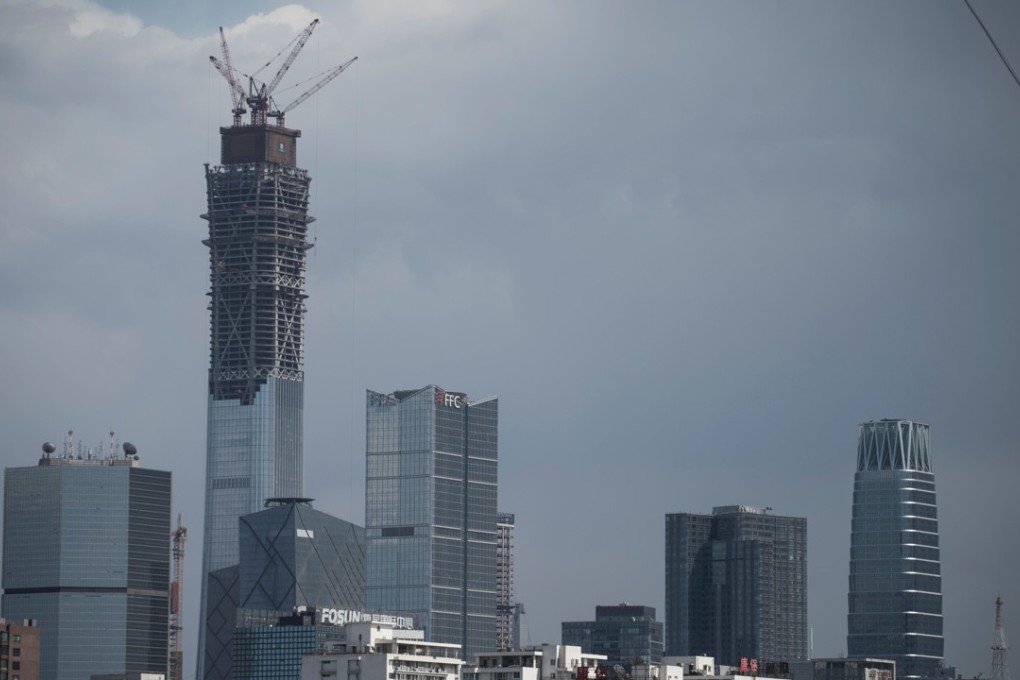 China’s growing indebtedness was cited by Moody’s as among reasons for its credit rating downgrade to A1 from Aa3 in May. Photo: AFP