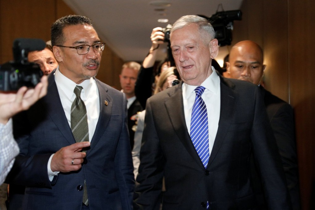 Malaysia's Defence Minister Hishammudin Hussein leaves a bilateral meeting with US Secretary of Defence James Mattis on the sidelines of the Shangri-La Dialogue in Singapore. Photo: Reuters