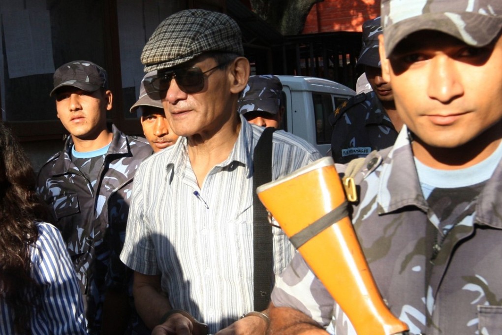 French serial killer Charles Sobhraj in Nepalese police custody in 2011. The prisoner has been taken to hospital for heart surgery. Photo: AFP