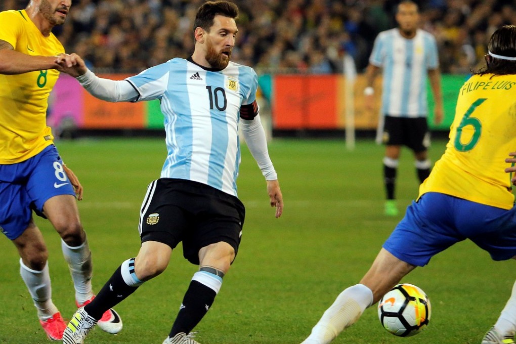 Argentina's Lionel Messi takes on the Brazil defence in Melbourne. Photo: Reuters