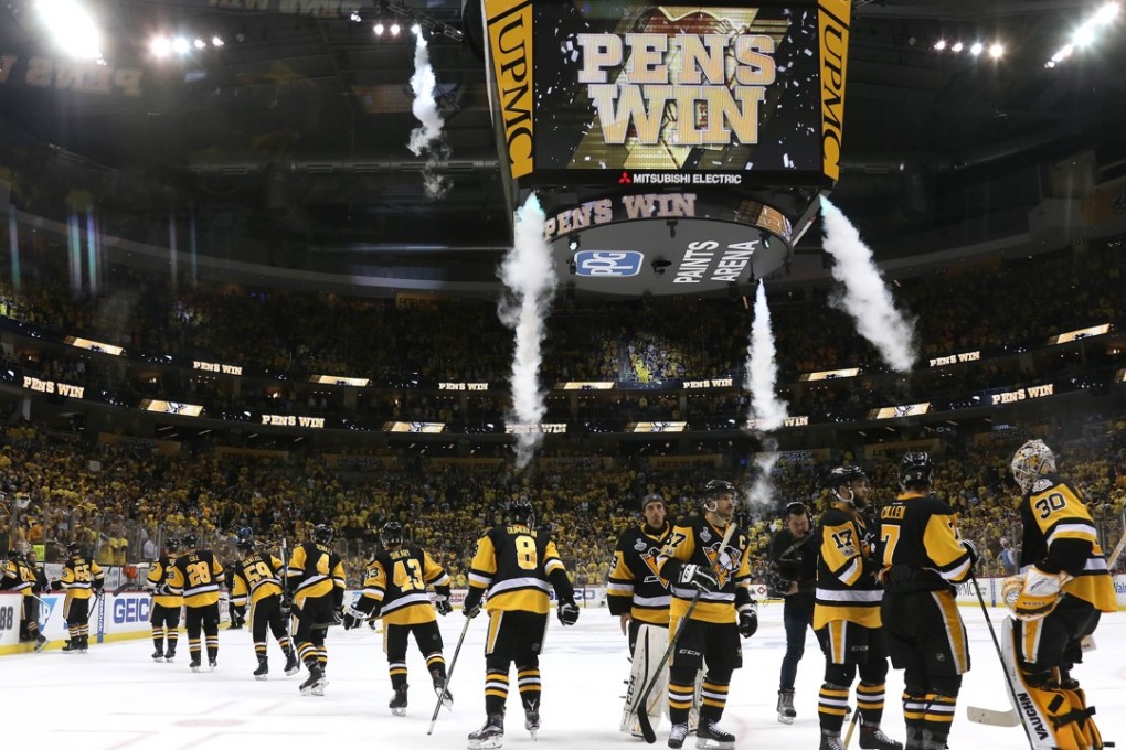 The Pittsburgh Penguins celebrate after defeating the Nashville Predators in game five of the NHL Stanley Cup final. Photo: AFP