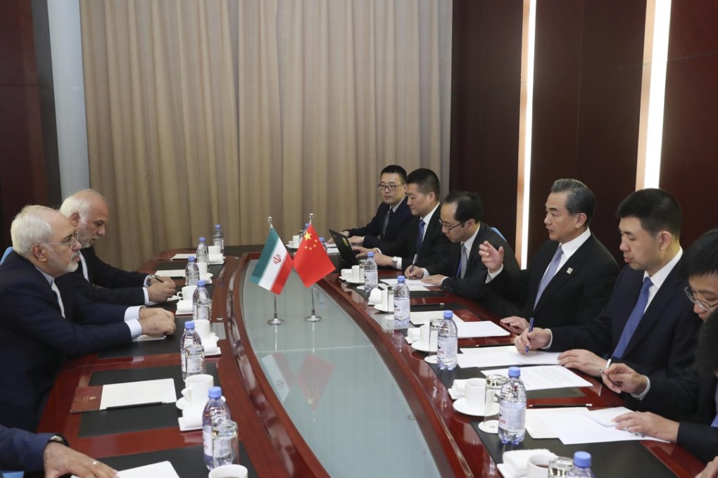 Chinese Foreign Minister Wang Yi meets with his Iranian counterpart Mohammad Javad Zarif in Astana, Kazakhstan, June 8, 2017. Photo: Xinhua
