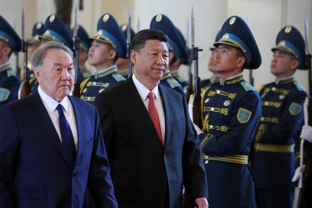 Kazakh President Nursultan Nazarbayev welcomes Chinese President Xi Jinping to the Shanghai Cooperation Organisation’s summit in Astana, Kazakhstan. Photo: Reuters