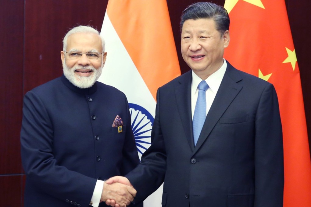 Indian Prime Minister Narendra Modi and Chinese President Xi Jinping attend the Shanghai Cooperation Organisation summit in Astana, Kazakhstan on Friday. Photo: Xinhua