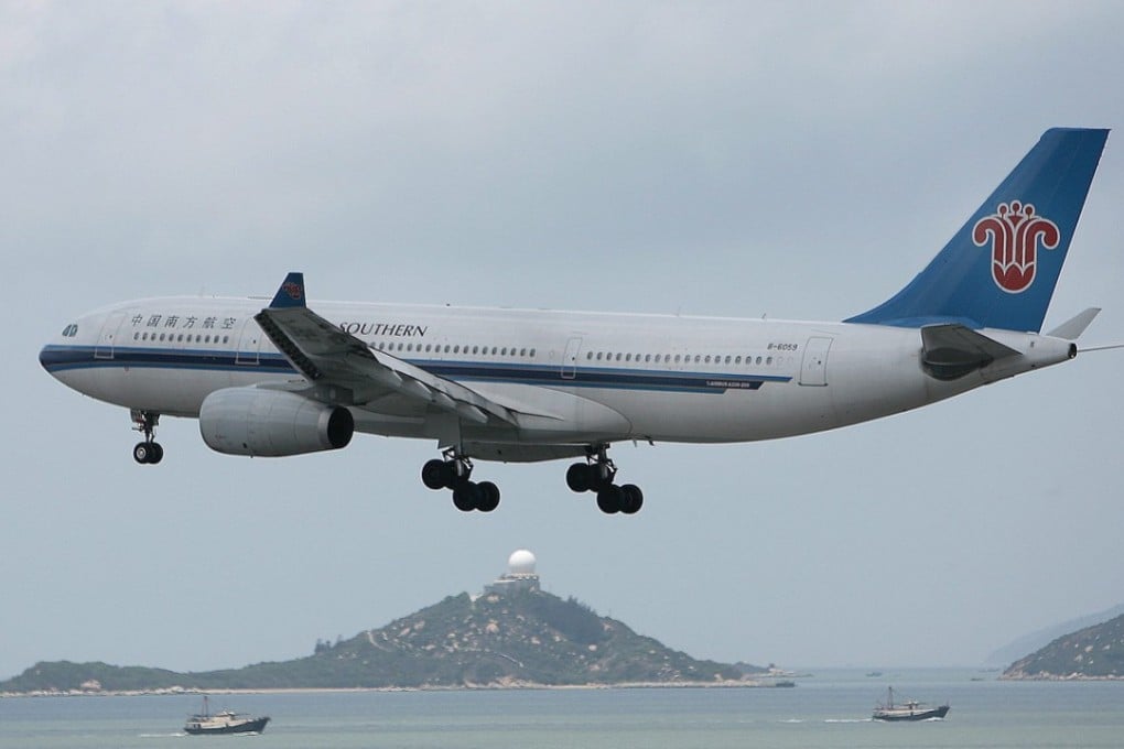 A China Southern Airlines plane approaches Hong Kong International Airport. Photo: EPA