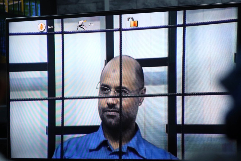 Saif al-Islam, the son of slain Libyan dictator Muammar Gaddafi on trial in 2014. File photo: AFP