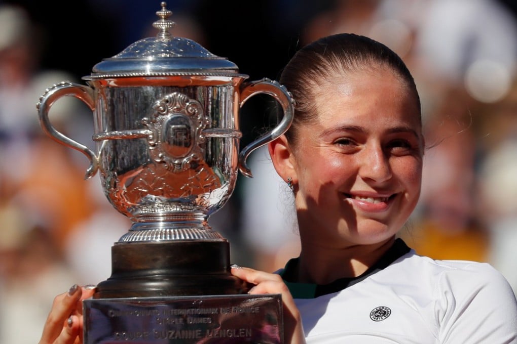 Latvia’s Jelena Ostapenko celebrates with the trophy after winning theFrench Open final against Romania’s Simona Halep. Photo: Reuters