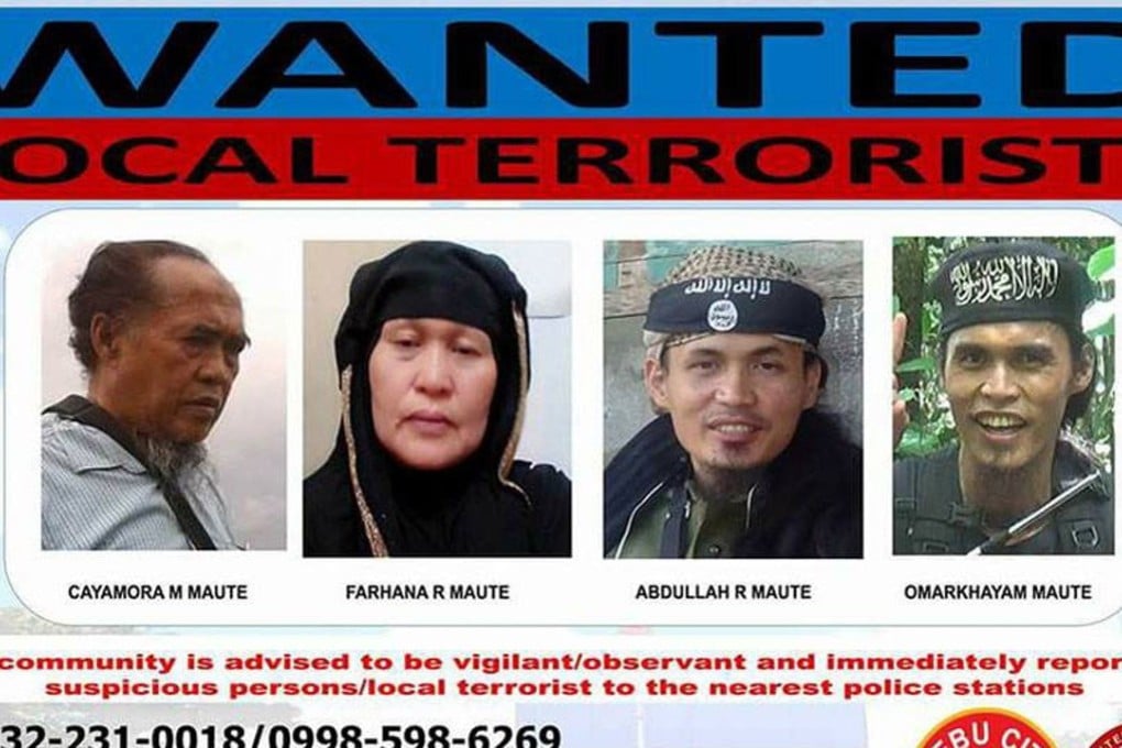 A wanted poster shows brothers Omarkhayam and Abdullah Maute (right), and their parents Cayamora and Farhana Maute, who have been detained. Photo: Handout