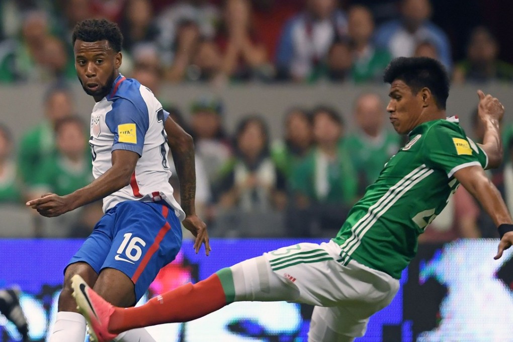 USA’s Kellyn Acosta is challenged by Mexico’s Jesus Gallardo during their 2018 World Cup qualifier draw. Photo: AFP