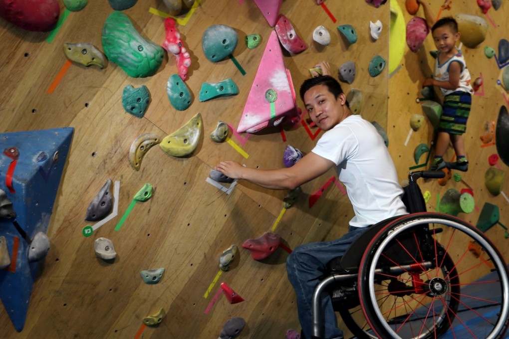Lai Chi-wai, with his son Gordon, at a climbing centre. Photo: Nora Tam