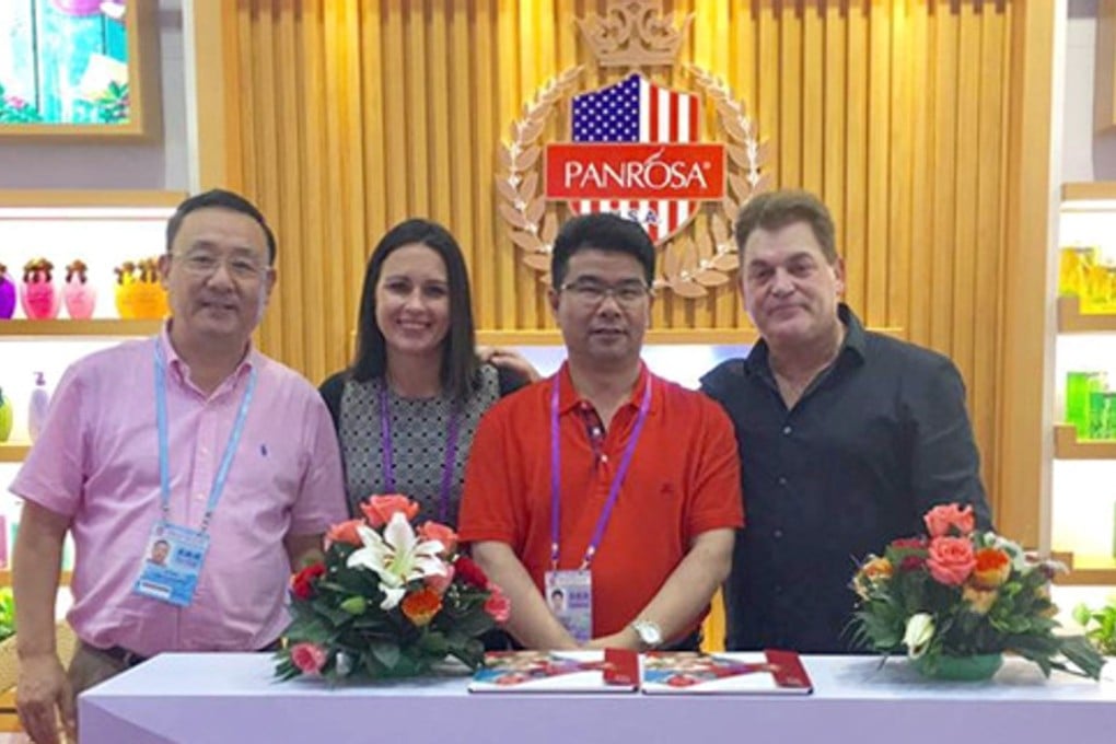 Peter Pan (left) and Reward Group vice-president Guo Jian with two of Panrosa’s American salespeople at the Canton Fair in May. Photo: Handout