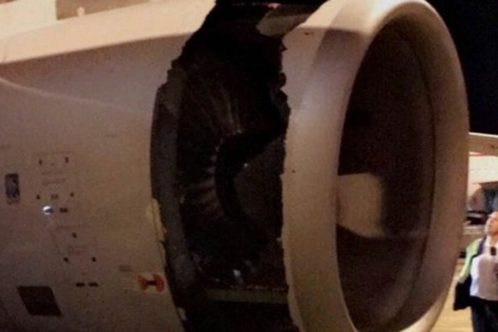 The huge hole in the engine casing was spotted after take-off. Photo: Handout