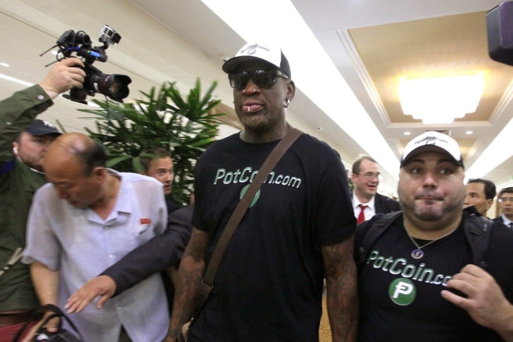Former NBA basketball star Dennis Rodman, arrives at Sunan International Airport in Pyongyang, North Korea. Photo: AP
