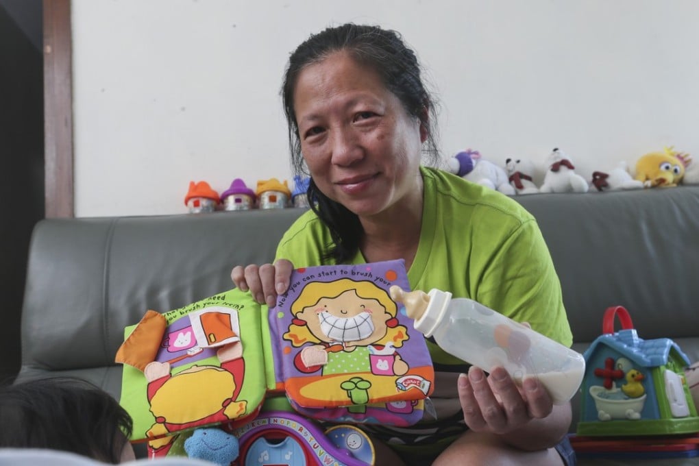 Chin Pui-chun is never happier than when she has a child to take care of. Photo: K. Y. Cheng