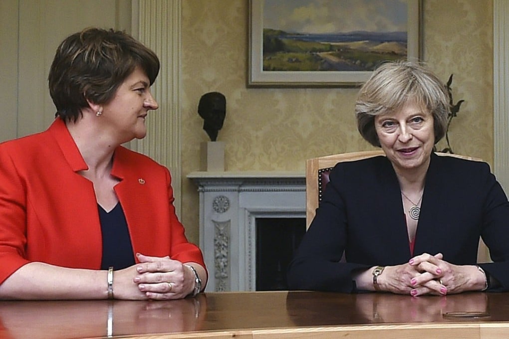 Arlene Foster, left, leader of the Democratic Unionist Party, with Britain's Prime Minister Theresa May. File photo: AP