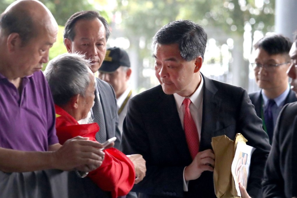 Chief Executive Leung Chun-ying meets protesters before the Executive Council meeting. Photo: Nora Tam