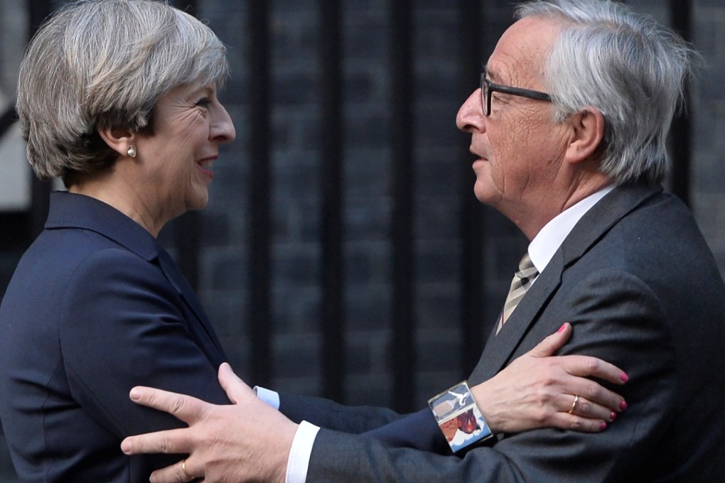 British Prime Minister Theresa May welcomes European Commission president Jean-Claude Juncker to Downing Street on April 26. Photo: Reuters