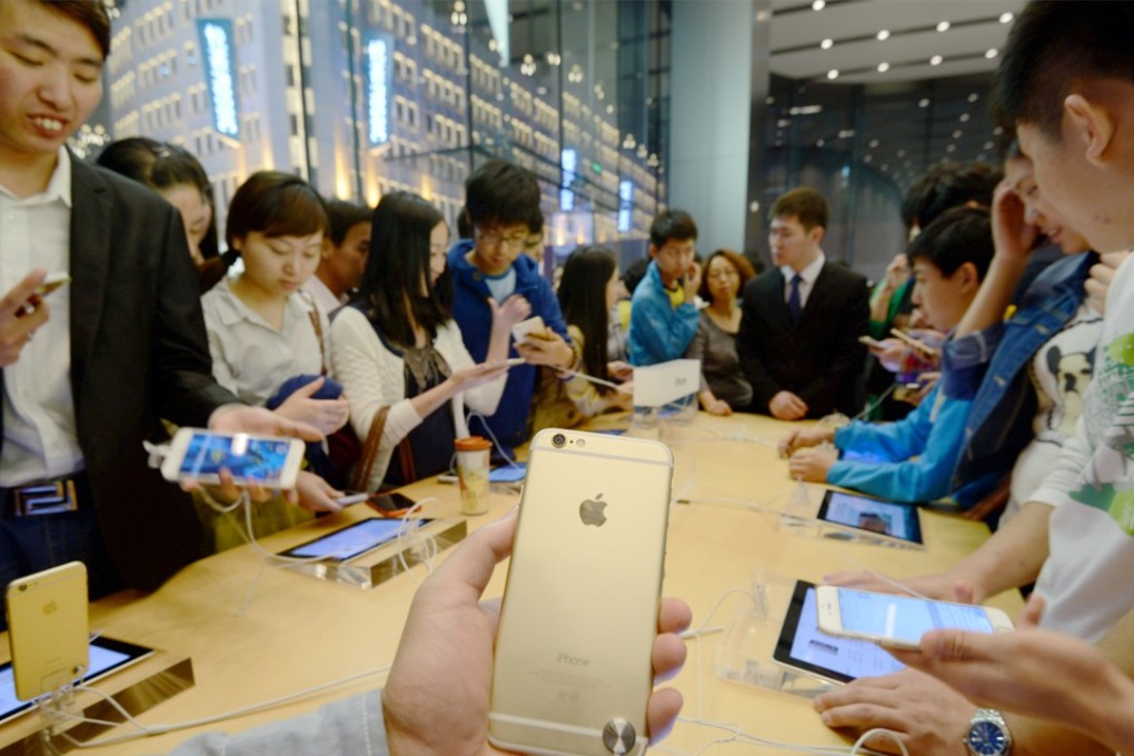 iPhones are all the rage in China, but they cost more than a new graduate’s monthly salary. Photo: Imaginechina