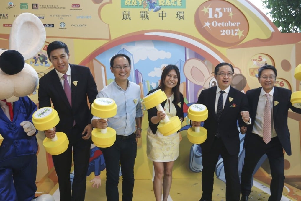 (From left): Co-chairman of the Central Rat Race Committee, Ronald Ho; Vice-chairman of the Central Western District, Chan Hok-fung; Executive director of Mindset, Esther Wong; Executive director of Hongkong Land, Raymond Chow Ming-joe; and Co-chairman of the Central Rat Race Committee, Daniel Kwok at a press conference for this year’s race. Photo: Xiaomei Chen