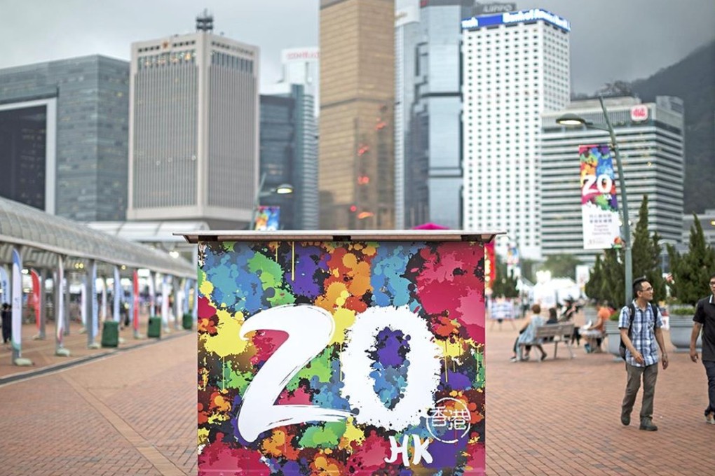A promo for Hong Kong's handover anniversary is displayed on the Central Harbour waterfront. Photo: EPA