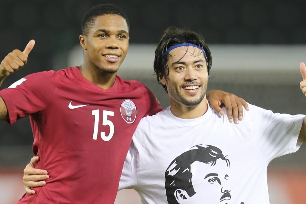 Rodrigo Barbosa Tabata (right) and Pedro Correia of Qatar celebrate after beating South Korea at the Jassim Bin Hamad Stadium in Doha. Photo: EPA