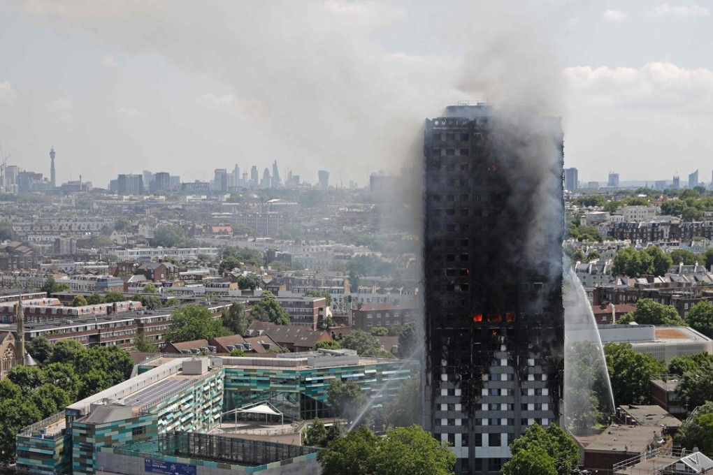 Smoke and flames billows from Grenfell Tower as firefighters attempt to control the blaze. Photo: AFP