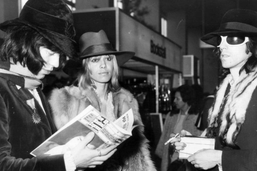 Mick Jagger (left) and Keith Richard (right) are seen at Heathrow Airport with Richards’ girlfriend Anita Pallenberg in December 1968. Photo: Central Press Photo