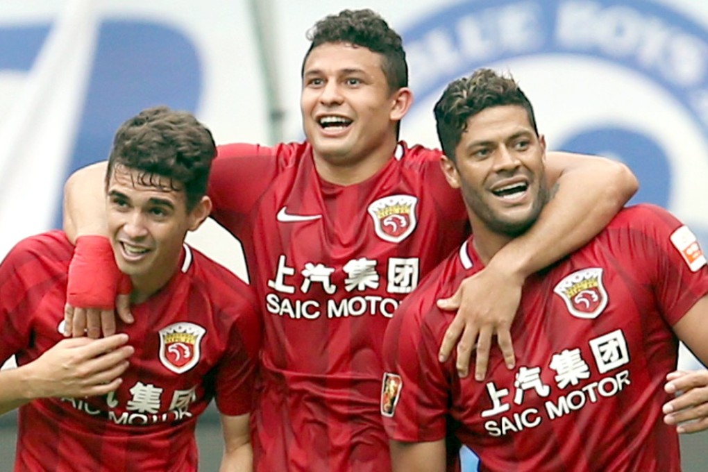 Shanghai SIPG’s Brazilian trio of Oscar (left), Elkeson and Hulk. Photo: Xinhua­
