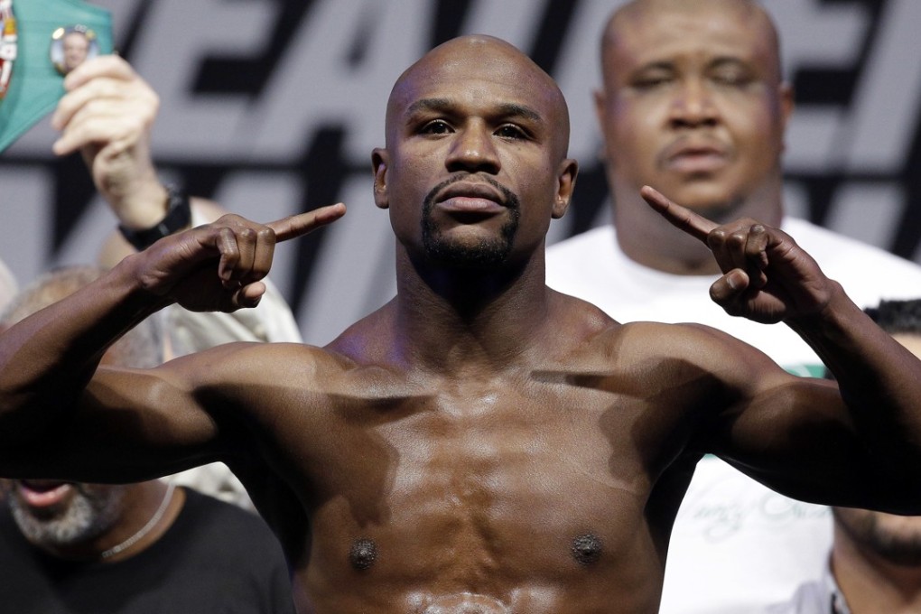 Floyd Mayweather Jnr has finally agreed to a big-money exhibition fight against MMA champion Conor McGregor. Photo: AP