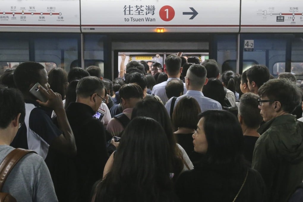 A packed Admiralty MTR station. The system in Hong Kong carried 1.9 billion passengers last year, while its overseas operations carries nearly as many: 1.8 billion, or 5.6 million daily. From solely a local rail operator in 1997, it has become a transport giant with a 17,600-strong workforce in Hong Kong, and nearly 10,000 staff around the globe. Photo: K. Y. Cheng