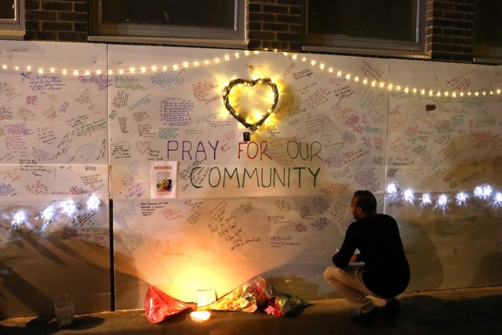 A wall near the tower block covered in messages for the missing and the dead. Photo: Reuters