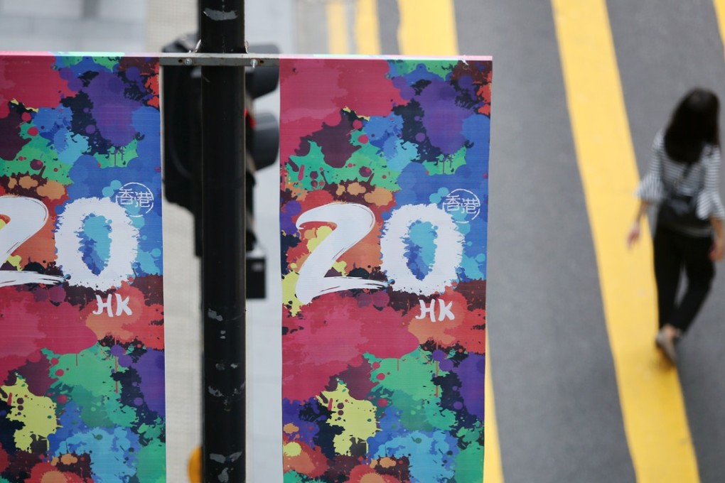 Banners in Central promote the 20th anniversary of the Hong Kong handover. Photo: Sam Tsang