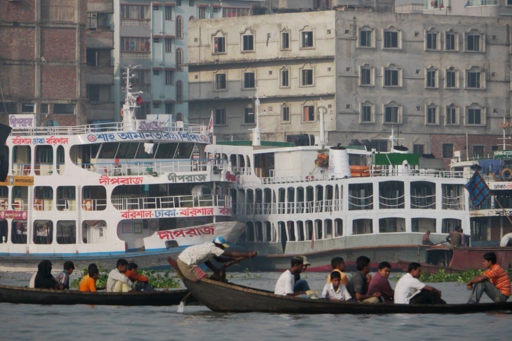 Ferries large and small on the Buriganga River, in Old Dhaka. Picture: Alamy