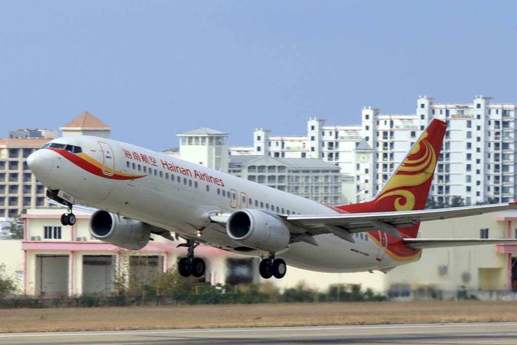A Hainan Airlines plane takes off from the Sanya Phoenix International Airport in Sanya, Hainan province. Photo: Reuters