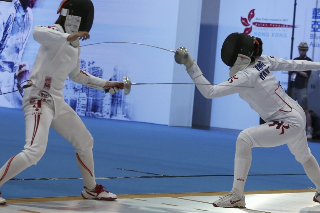 Japan's Ayaka Shimookawa (left) and Hong Kong's Vivian Kong during their epee quarter-final. Kong won the bout and reached the final, where she lost 13-12. Photos: Jonathan Wong