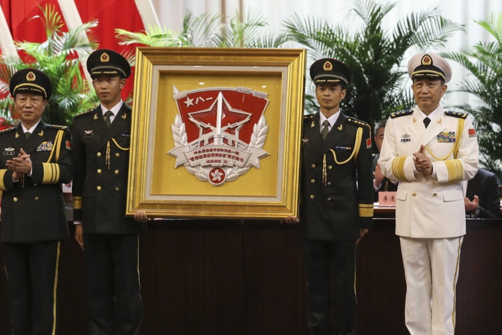 Commander Yuan Yubai (in white uniform) of the Southern Theatre Command is one of the authors of the article. Photo: Edward Wong