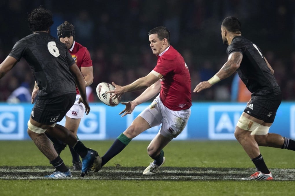 British & Irish Lions fly half Jonathon Sexton passes the ball to a teammate against the New Zealand Maori in Rotorua. Photos: AP