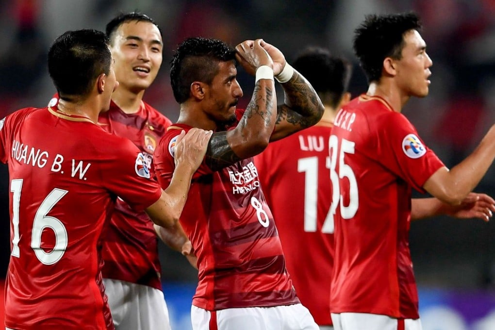 Guangzhou Evergrande’s Brazilian Paulinho celebrates. Photo: AFP